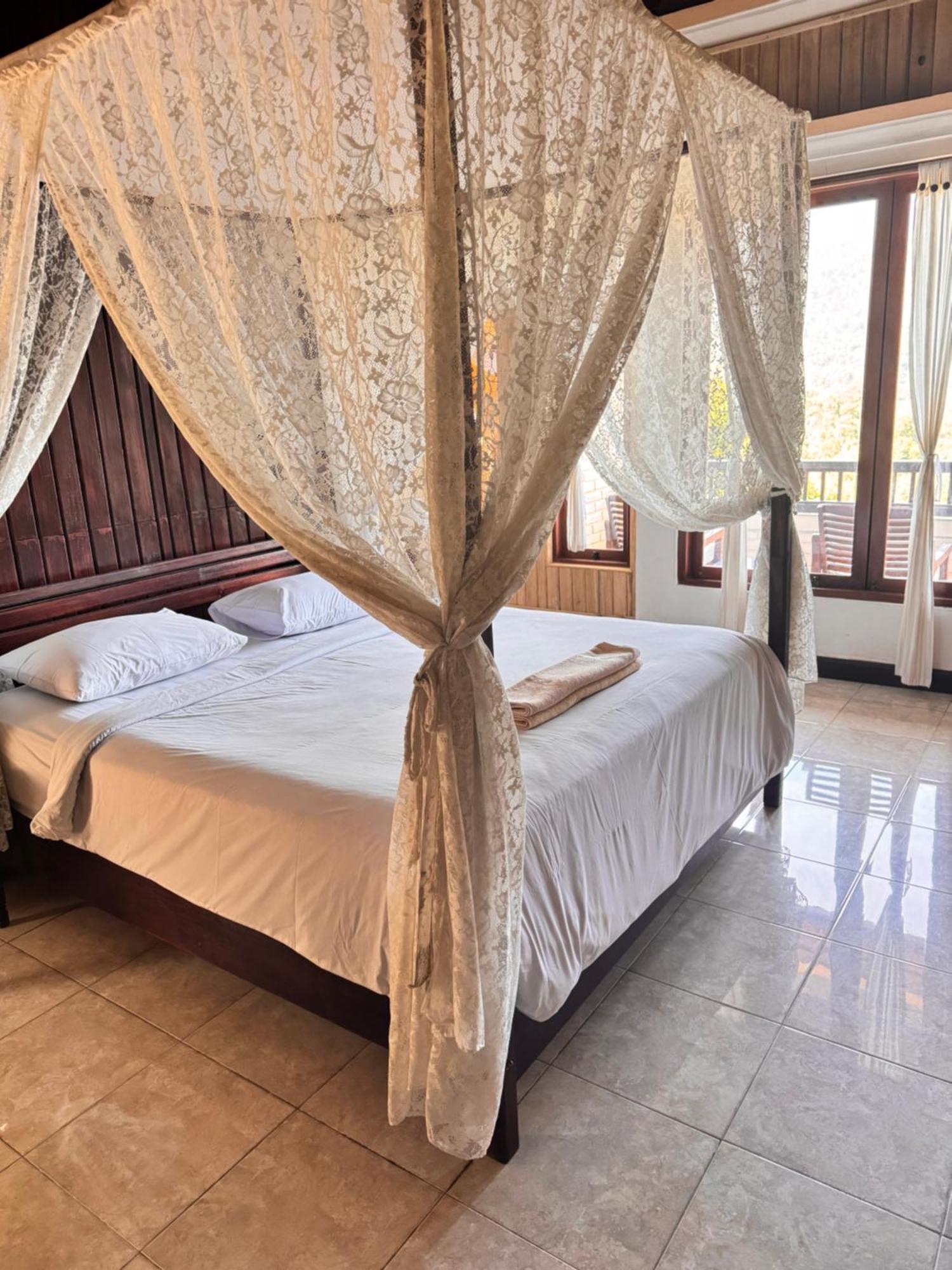 Отель Puri Alam Bali Мундук Экстерьер фото